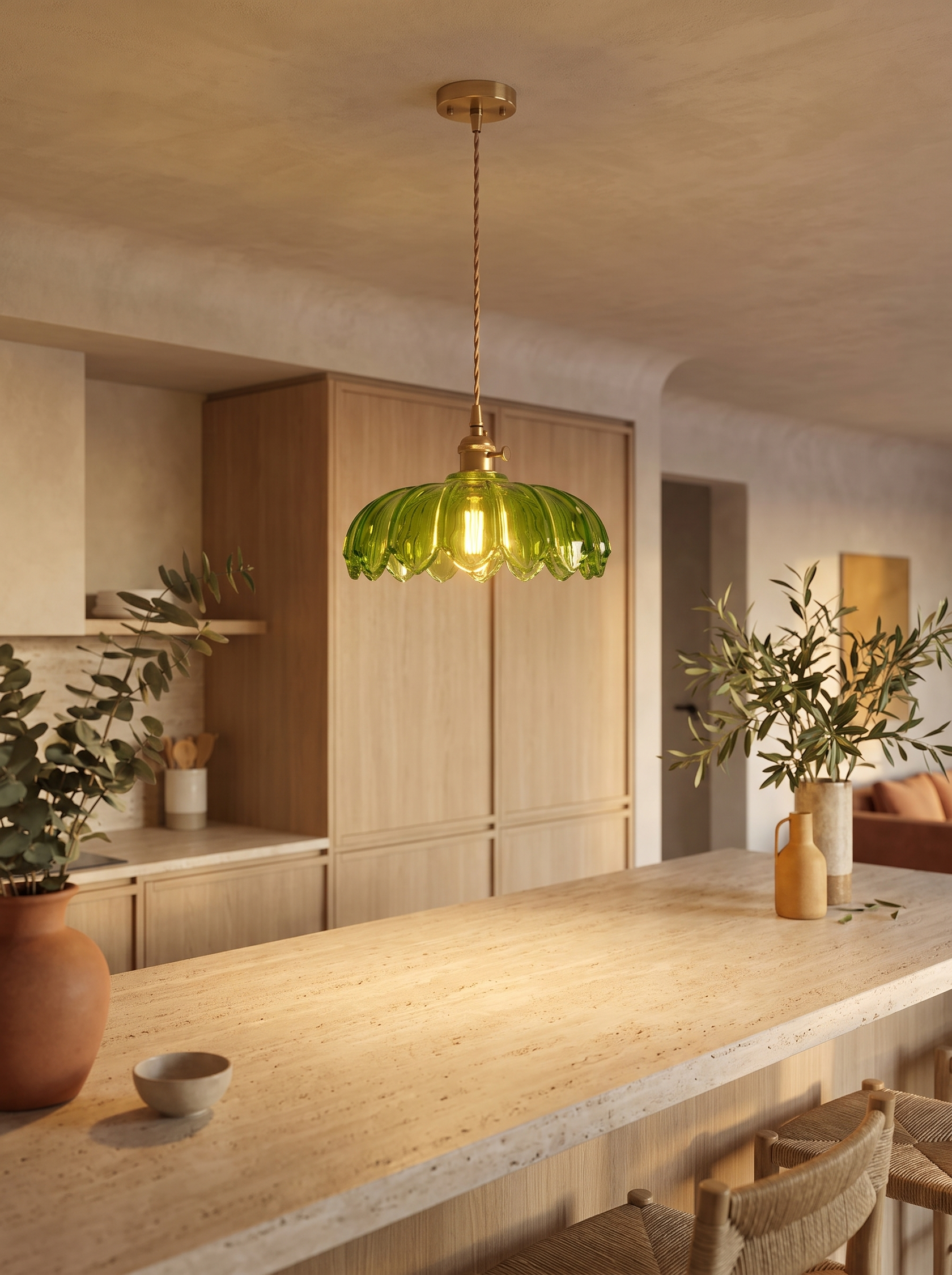 Fiora pendant above a travertine breakfast bar seen from across the room
