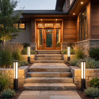 Aurelia Bollard Path Lights flanking entrance steps