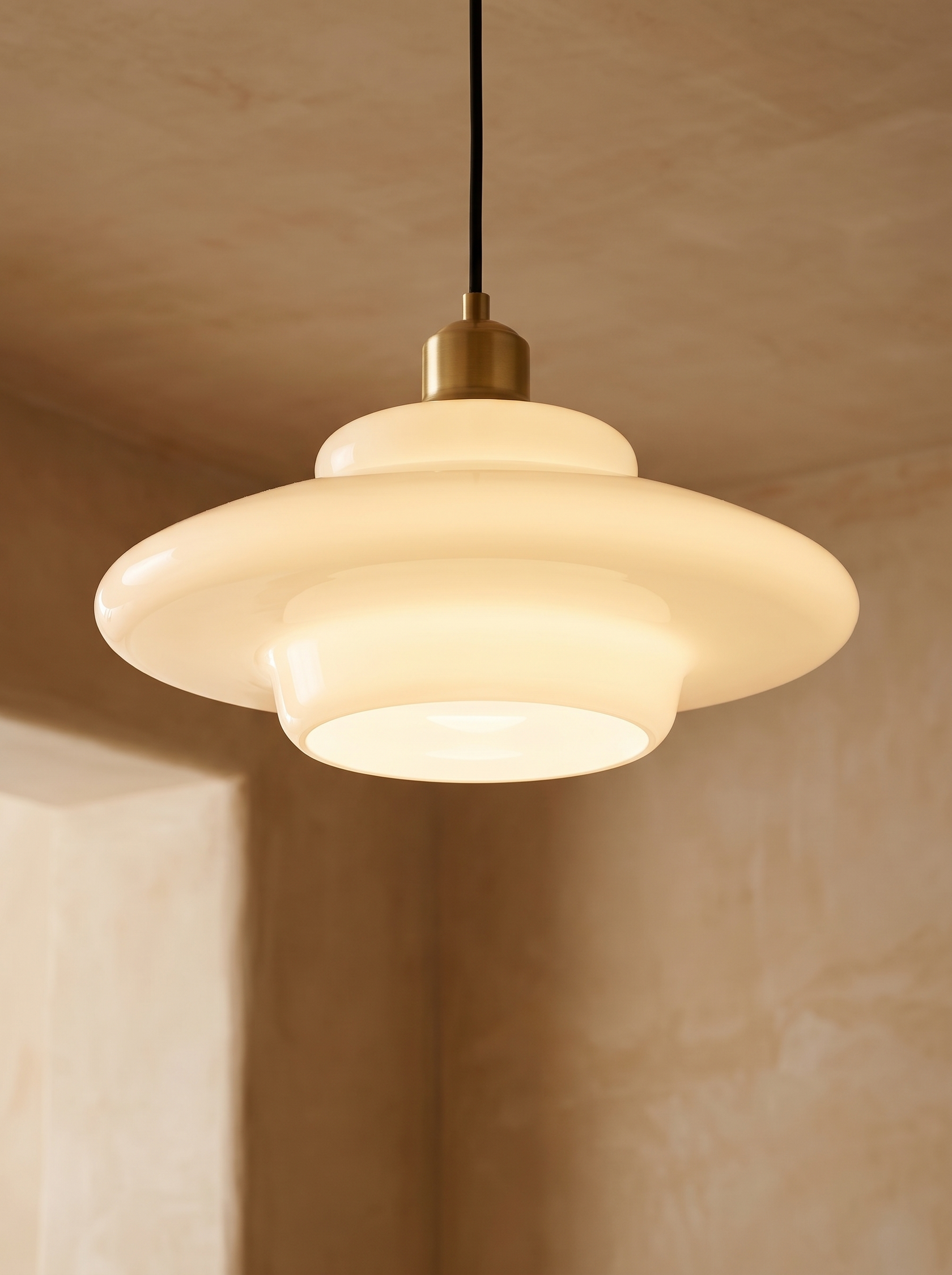 Lattea pendant seen from below showing an even glow with no visible bulb